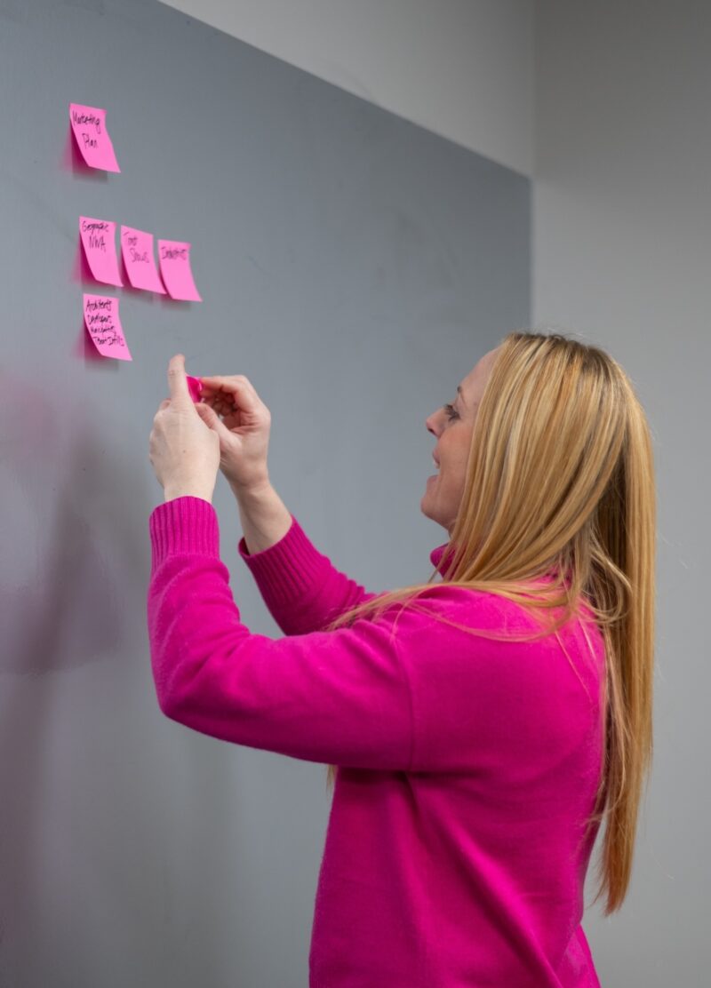 Lindsay Young Placing Post its - What sets us apart from other marketing firms?